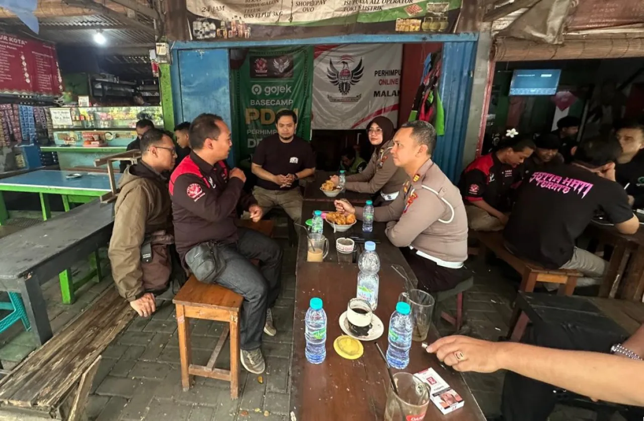 Ket Foto : Polresta Malang Kota Rangkul Komunitas Ojol Waspadai Dampak Isu Global